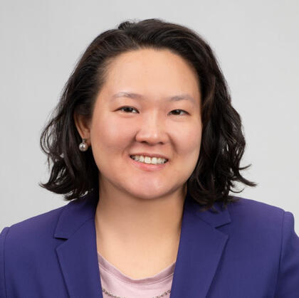 Sheila Xu Sheila is smiling and wearing a pink top with a purple blazer.